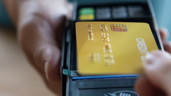 Pay at the store with a card reader.