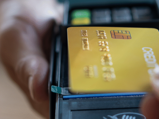 Pay at the store with a card reader.